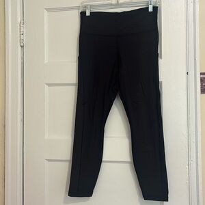 Athleta Size M. Ultimate Stash Pocket 7/8 Tight